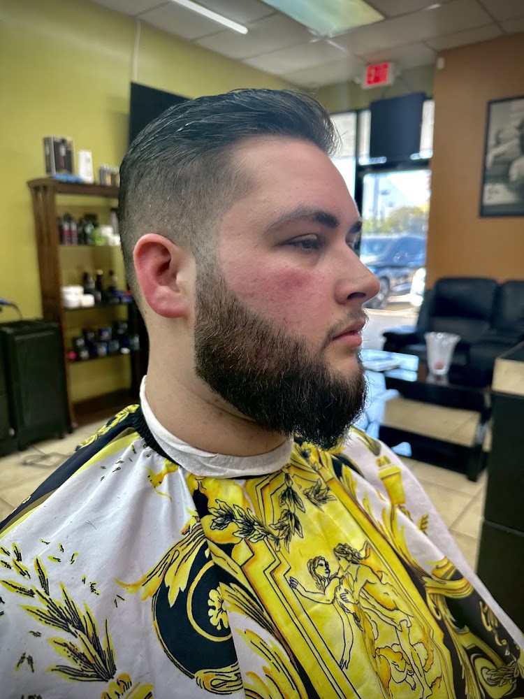 Finished taper fade and shaped beard